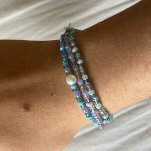 Blue and purple elastic beaded bracelet set